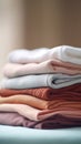 A stack of folded white and pink colored clothing, AI