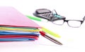Stack of folders containing work documents in different colors Royalty Free Stock Photo