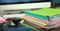 Stack of folders containing work documents in different colors Royalty Free Stock Photo