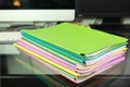 Stack of folders containing work documents in different colors Royalty Free Stock Photo