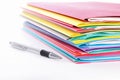 Stack of folders containing work documents in different colors Royalty Free Stock Photo