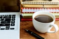 Stack of folders and documents on office desk with coffee and la Royalty Free Stock Photo