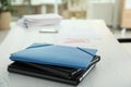 Stack of folders with documents on office table. Royalty Free Stock Photo