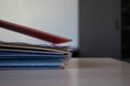 A stack of folders with documents on the table Royalty Free Stock Photo
