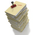 Stack of folders with rubber stamp message of Finished