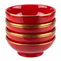Stack of Four Glossy Red Bowls with Golden Rims on White Background Royalty Free Stock Photo