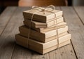 A stack of four neatly wrapped, rectangular cardboard boxes on a Royalty Free Stock Photo