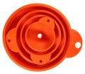 Stack of four orange plastic funnels isolated on white background. Royalty Free Stock Photo