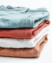 A stack of four pairs of pants in different colors. Generative AI. Royalty Free Stock Photo