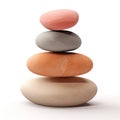 Stack of four smooth balanced colorful pebbles representing harmony and balance Royalty Free Stock Photo
