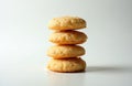 Stack of four tapioca starch biscuits on white surface. Light golden baked goods are round and slightly puffed, showing a tender Royalty Free Stock Photo
