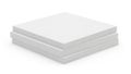 Stack of four white square notebooks or paper pads placed neatly on a plain background Royalty Free Stock Photo