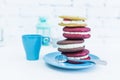 Stack of four whoopie pies or moon pies with cup and spoon. Royalty Free Stock Photo