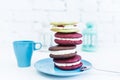 Stack of four whoopie pies or moon pies with cup and spoon. Royalty Free Stock Photo