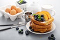 Stack of french toast with fresh peaches and blueberry Royalty Free Stock Photo