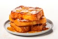 Stack of French toast with maple syrup or honey on a white plate. Royalty Free Stock Photo