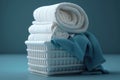 Stack of fresh clean towels in the wicker basket on the table. AI generation Royalty Free Stock Photo