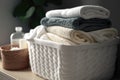 Stack of fresh clean towels in the wicker basket on the table. AI generation Royalty Free Stock Photo