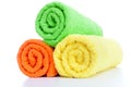 Stack of fresh colorful towels rolls isolated Royalty Free Stock Photo