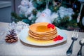 Stack of fresh golden pancakes or flapjacks topped Royalty Free Stock Photo