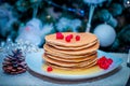 Stack of fresh golden pancakes or flapjacks topped Royalty Free Stock Photo