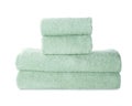 Stack of fresh light towels isolated
