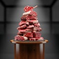 Stack of Fresh Raw Meat Cuts on Wooden Table Royalty Free Stock Photo