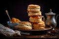 stack of freshly baked biscuits with a bite taken