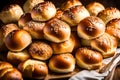 A stack of freshly baked dinner rolls, golden brown and glistening, ready to be served alongside a Thanksgiving meal. --ar 3:2 --v Royalty Free Stock Photo