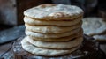 Stack of freshly baked flatbread on a wooden surface Royalty Free Stock Photo