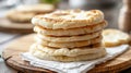 Stack of freshly baked flatbread on a wooden surface Royalty Free Stock Photo