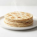 Stack of freshly made flour tortillas on a white plate Royalty Free Stock Photo