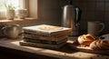 Stack of German Baking Books with Sweet Rolls and Kitchen Setting in Warm Light Royalty Free Stock Photo