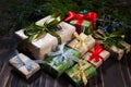 Stack of gift box by Christmas tree. Royalty Free Stock Photo