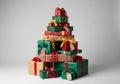 A stack of gift boxes in various sizes arranged in a pyramid shape. The boxes are wrapped in Royalty Free Stock Photo