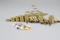 Stack of gold coin and miniature people Royalty Free Stock Photo