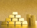 Stack of gold coins and bullions Royalty Free Stock Photo