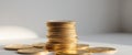 A stack of gold coins is shown in a close up Royalty Free Stock Photo