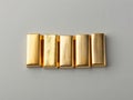 Stack of gold ingots on a grey surface, suitable for banking and luxury marketing