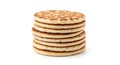 Stack of golden brown flatbreads with a patterned surface on a white background Royalty Free Stock Photo