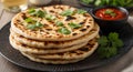 Stack of Golden Brown Naan Bread Garnished with Fresh Cilantro indian bread flatbread Royalty Free Stock Photo