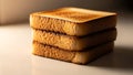 Stack of Golden Brown Toasted Bread Slices on White Surface Royalty Free Stock Photo