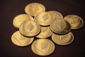 Stack of golden ether coins or Ethereum coins close up depicting cryptocurrency and digital money