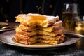 stack of golden french toast on plate