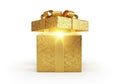 Stack of golden gift boxes emitting warm light Royalty Free Stock Photo