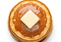 Stack of golden pancakes with butter isolated on white background Royalty Free Stock Photo