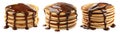 Stack of golden pancakes covered in thick chocolate syrup, isolated on white background, concept of sweet breakfast Royalty Free Stock Photo