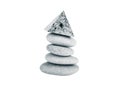 Stack of gray stones on a white background. Toned