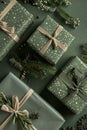 A stack of green boxes with gold ribbons and stars on them Royalty Free Stock Photo