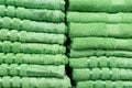 A stack of green fluffy towels in close-up Royalty Free Stock Photo
